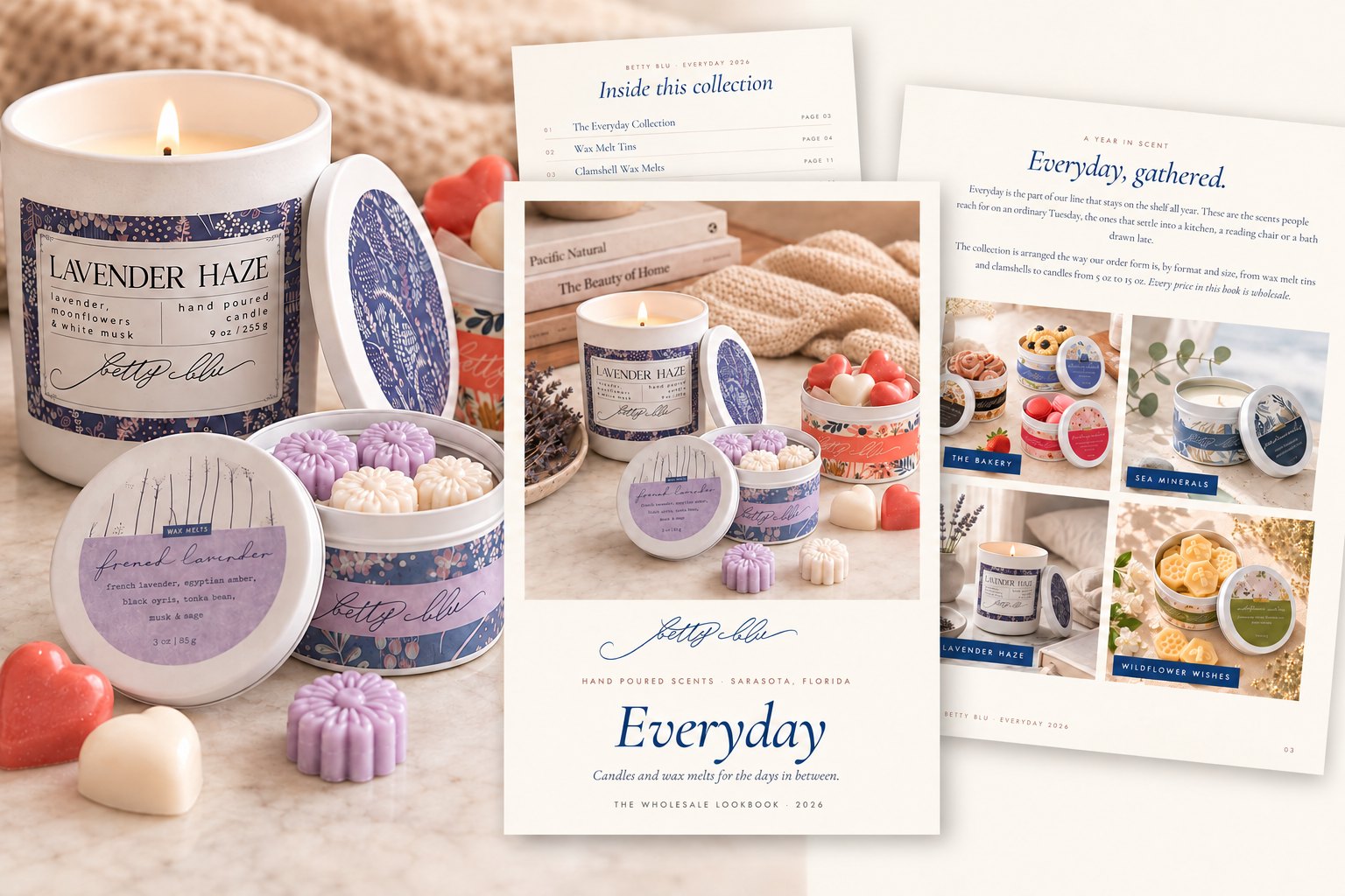 A lookbook laid open beside its cover, a candle tin and wax melts in soft light